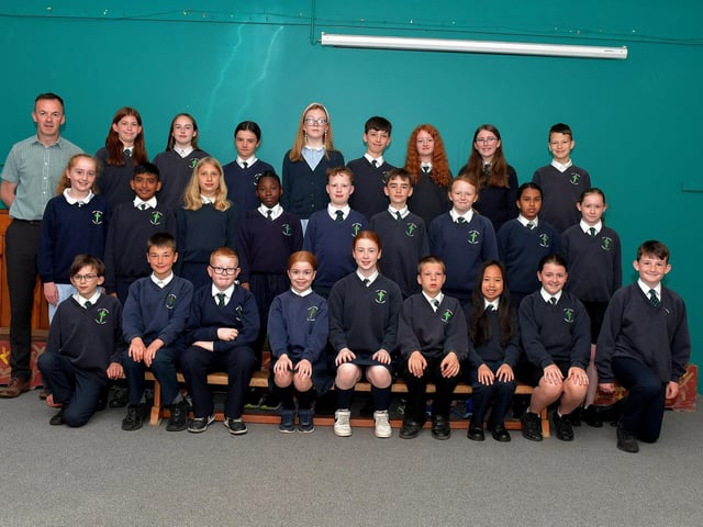 Mr Herron pictured with his P7 leavers class at Good Shepherd Primary School. DER2321GS – 33