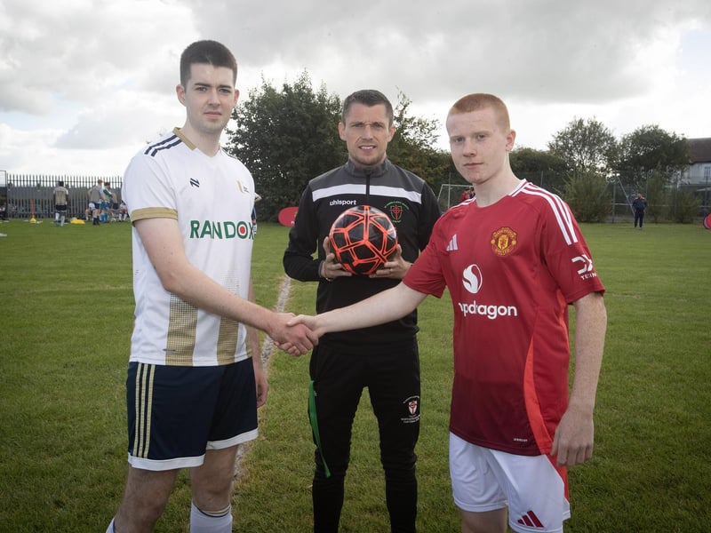 Man United Foundation captain, Caoimhin Green welcoming the Ulster University Magee team captain to St Joseph's Boy's School, alongside Mr. McGinty, BTEC teaching staff.
