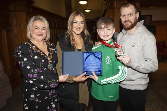 The Mayor of Derry City and Strabane District Council, Sandra Duffy pictured with Strabane teenager Lucas O’Connell and his parents mum Kerry and dad Eathan at Tuesday night’s reception in his honour at the Guildhall, Derry.