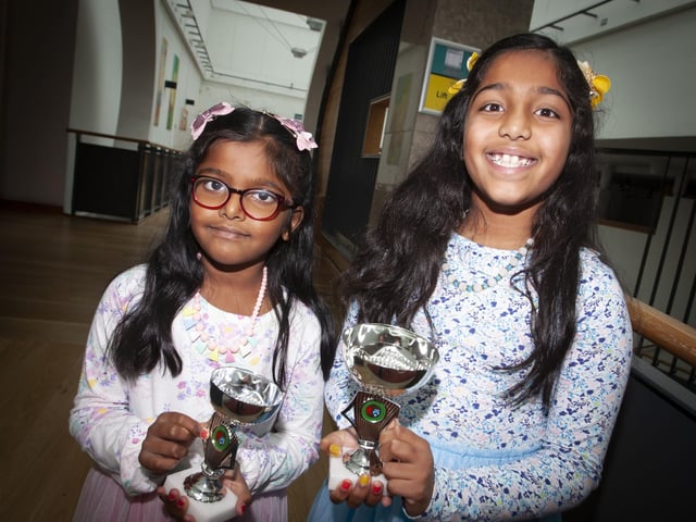 Sisters Thanmaya and Ameya Nair pictured with their awards on Saturday.