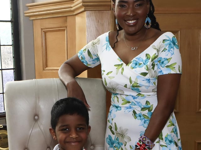 Mayor Lilian Seenoi Barr with Lisnagelvin PS pupil Khalid with the mayoral chain when members of the student council visited the Mayor's Parlour.