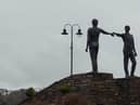 The Hands Across The Divide statue by Maurice Harron.