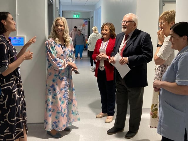 Dr. Meabh Cosgrove, Western Trust Divisional Clinical Lead for Obstetrics and Gynaecology, Western Trust Director of Acute Services, Geraldine McKay and Chair of the Western Trust Board Dr. Tom Frawley with staff at the official opening of a new antenatal clinic at Altnagelvin.
