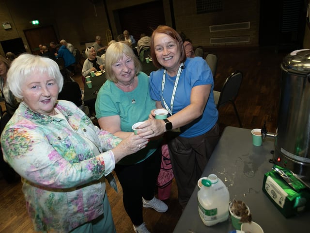 NMT manager Donna McCloskey serving Kay Carlin and Mary McCloskey at Friday's event in Pilot's Row.