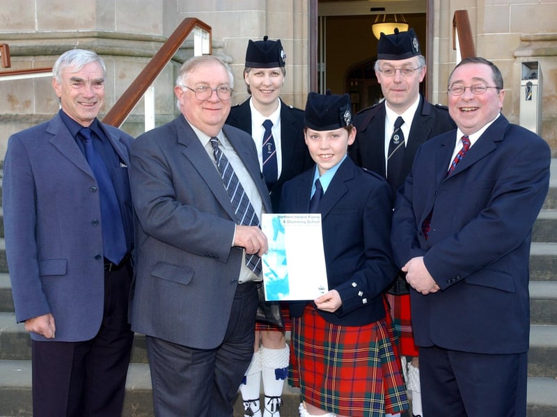 Group pictured at the Northern Ireland Piping and drumming school, Magee Campus, annual presentation of certificates. Included, from left, are Sam Bailie, director, Professor, Tom Frazier, Ciaran Barr, winner, Victoria and Norman Cochrane, administrator, and Professor Billy Kelly. (1605A60)