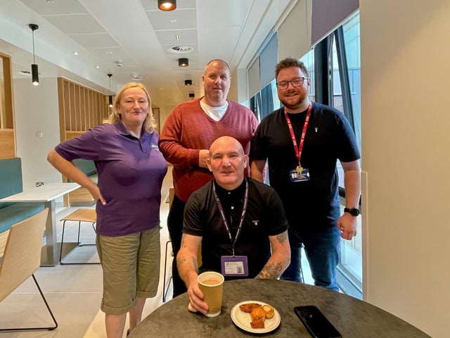 Enjoying a cuppa and bite to eat at the opening of the new Crossroads restaurant.