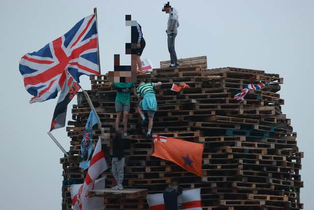 Flags and banners on a large bonfire to mark the Catholic Feast of the Assumption in the Galliagh area in 2021. Picture date: Sunday August 15, 2021.