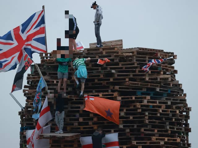 Flags and banners on a large bonfire to mark the Catholic Feast of the Assumption in the Galliagh area in 2021. Picture date: Sunday August 15, 2021.