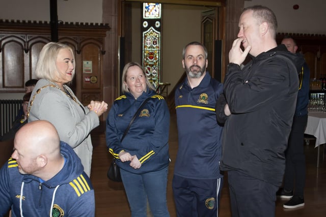 Don Bosco FC coaches in conversation with Mayor, Sandra Duffy before Friday night’s reception in the Guildhall.