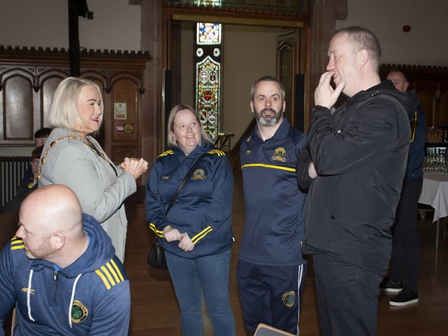 Don Bosco FC coaches in conversation with Mayor, Sandra Duffy before Friday night’s reception in the Guildhall.