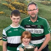 Na Magha's Gearalt O Mianain pictured with his son Fionan and daughter Laoise at the Derry Poc Fada.