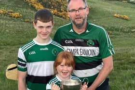 Na Magha's Gearalt O Mianain pictured with his son Fionan and daughter Laoise at the Derry Poc Fada.
