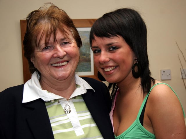 Granny Annie and birthday girl Tanya smile for the camera 0132JML : Parties and celebrations across Derry in May 2006.