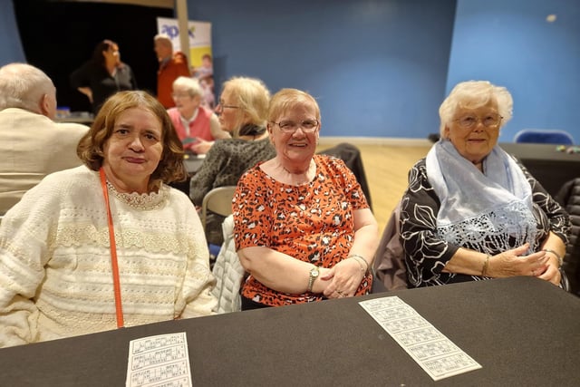 Bernadette Lynch, Bridie McCallion and Lily Gallagher prepare for a game of bingo at the event held in the Gasyard Centre