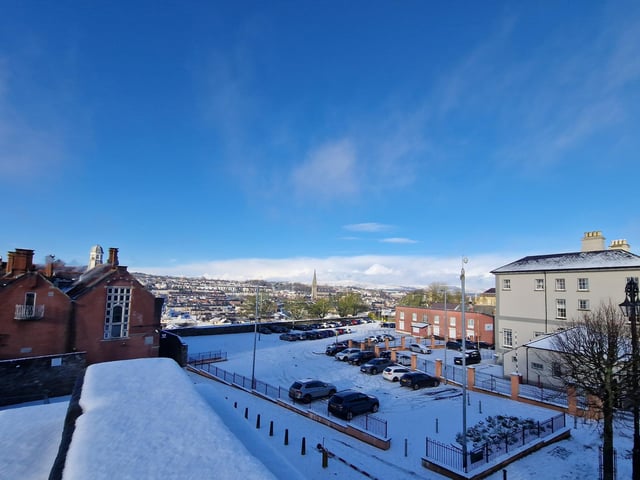St. Eugene''s Cathedral and the Bogside in the distance between the Verbal Arts Centre and Freemasons' Hall.