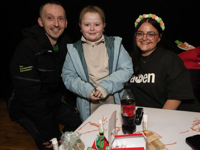Mollaí de Bruin with Barry McCabe and his daughter Aoibhe at the St Patrick’s Family Day held in An Cultúrlann. (Photo - Tom Heaney, nwpresspics)