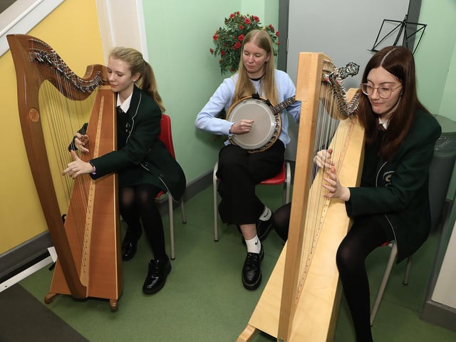 Harpists Fallon McKinney and Maeve Coyle with banjo player Shannon Duggan playing at St. Cecilia’s College Open Night. (Photo - Tom Heaney, nwpresspics)