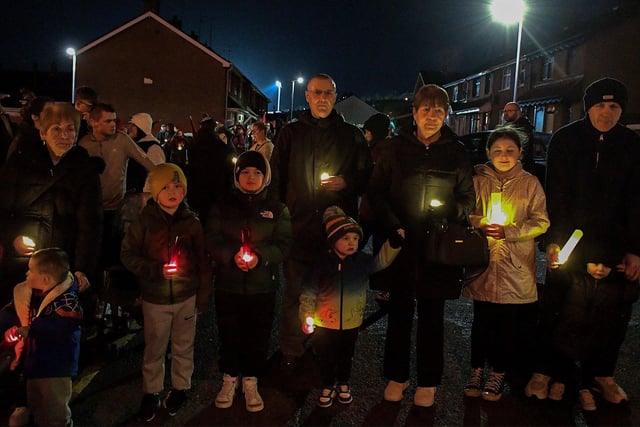 Omar Barghouti (centre), founding committee member of Palestine Campaign for the Academic and Cultural Boycott of Israel pictured at Thursday evening’s procession and vigil for the children of Palestine at the Bloody Sunday Monument on Rossville Street. Photo: George Sweeney