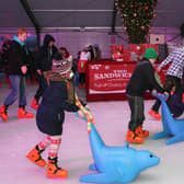 2014: Young skaters at the Legenderry on Ice rink in Ebrington Square. DER 5014-3802MT.