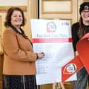 Mayor of Derry City and Strabane District Council, Cllr Patricia Logue, Lea Dickson, Training and Community Engagement Officer, Positive Life, and Dr Melissa Perry, Consultant in Sexual Health, and HIV, at the signing of the Fast Track Cities Pledge at the Guildhall.