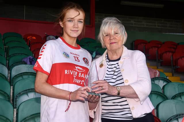 Derry’s Leah Cassidy receives her player of the match award after the U16 B Camogie All-Ireland Championship Final. (INPHO/Ciaran Culligan)