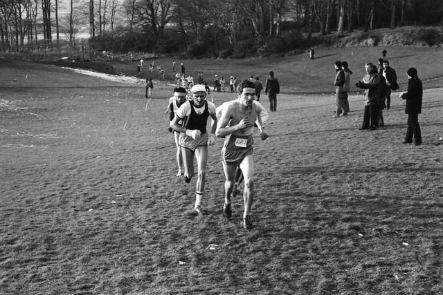 The leading pack tackle the hill at the 1984 Ulster Cross Country Championships at St Columb's Park.