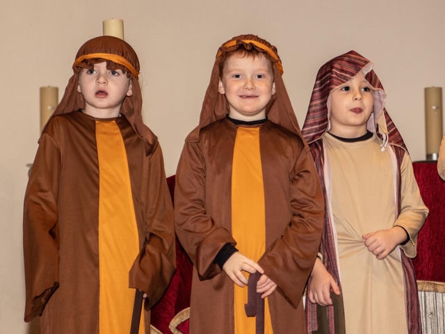 The Three Wise Men get into position before the start of proceedings in St. Brigid's Church on Wednesday.