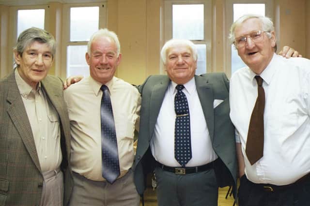 Old friends, John Moore, James McCarron, George Gale and Jim Pewtner meet up again at the Bishop Street reunion. 050603HG12