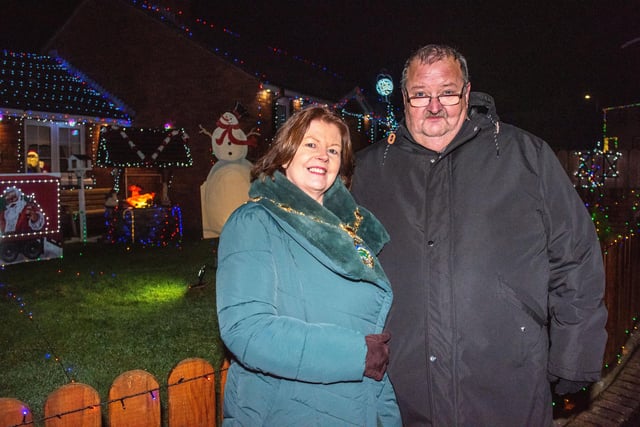 The Mayor Councillor Patricia Logue pictured with Martin Carr who helped with the decorations at the Christmas Lights Switch on in Amelia Court. Picture Martin McKeown. 01.12.23