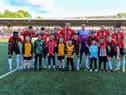Mascots pictured with Derry City’s starting eleven for the game against Dundalk, at Brandywell Stadium, on Monday evening. Photo: George Sweeney.  DER2320GS – 47  
