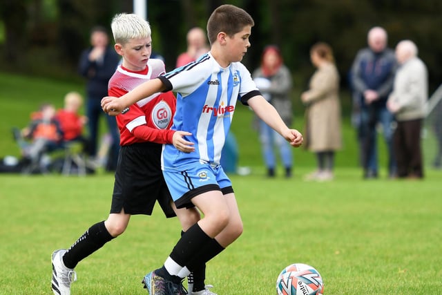 Action from the Under-10 match between Strabane Athletic and Maiden City Academy Colts.