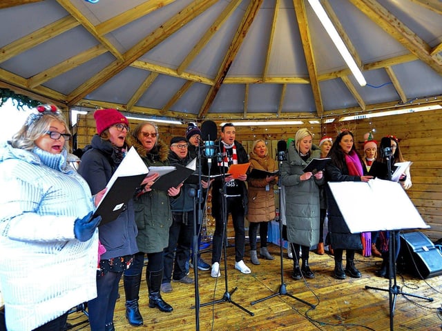 Derry City and Strabane District Council choir singing at Christmas Market in Guildhall Square on Friday afternoon.  Photo: George Sweeney. DER2250GS – 70