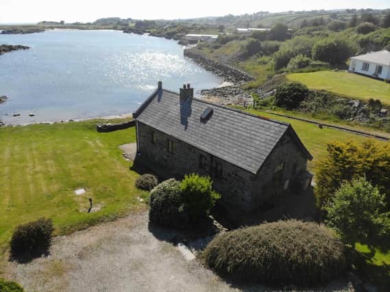 'Beautifully located' former RNLI boathouse on the market in Greencastle with 'excellent views' over Lough Foyle