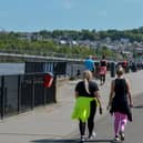 People exercise, in the sunshine, along the Foyle Embankment (File picture). DER2220GS - 012