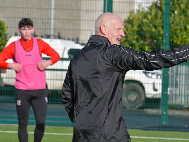Paul Hegarty issues instructions on the training pitch as he gets to know some of the Derry City players. Photo by Kevin Morrison.