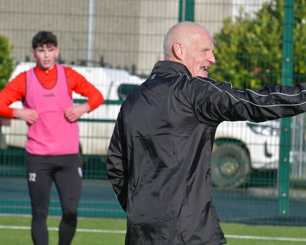 Paul Hegarty issues instructions on the training pitch as he gets to know some of the Derry City players. Photo by Kevin Morrison.