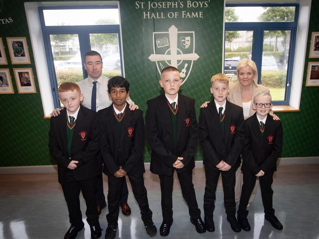 Mr. O'Loughlin, Head of Junior School and Miss Shiels, Primary Schools Co-Ordinator, pictured with some of the new Year 8 students at St. Joseph's Boys School on Monday. From left, Riley McGahey, Abel Thomas, Odhran Rudd, Conleth McKay and Jackson Feeney. (Photos: Jim McCafferty Photography) : St. Joseph's Boys School welcomes latest influx of Year 8 pupils