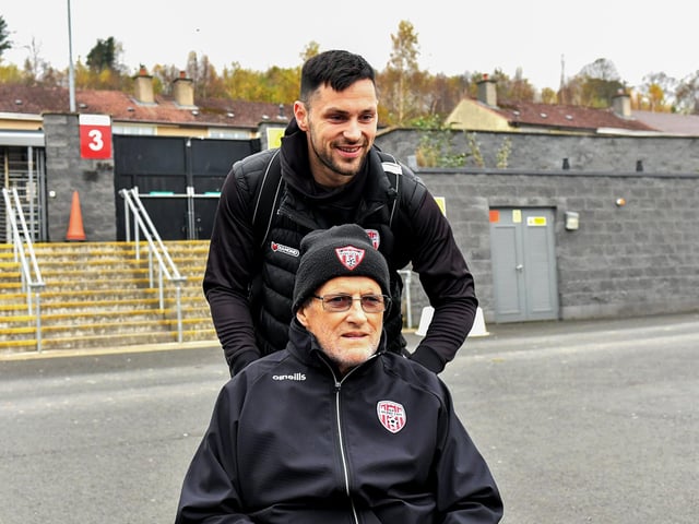 Former Derry City steward Patsy Bradley pictured with Pat Hoban on Saturday morning prior to the team’s departure for Dublin ahead of Sunday’s FAI Cup Final against Drogheda United. Photograph: George Sweeney.