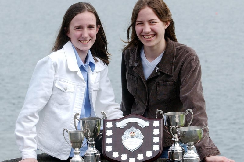 Sisters Fionnuala and Kate Lindsay from Muff with their silverware won at Moville Feis. (0605C47)