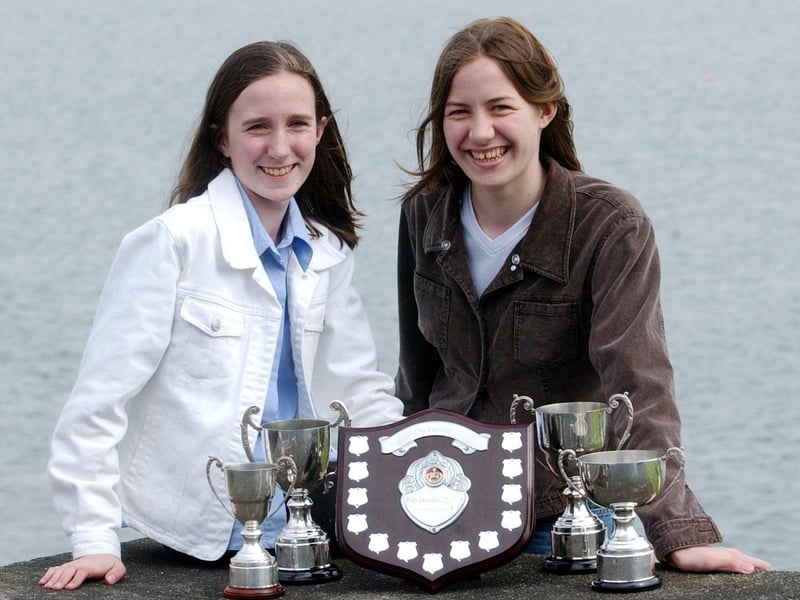 Sisters Fionnuala and Kate Lindsay from Muff with their silverware won at Moville Feis. (0605C47)