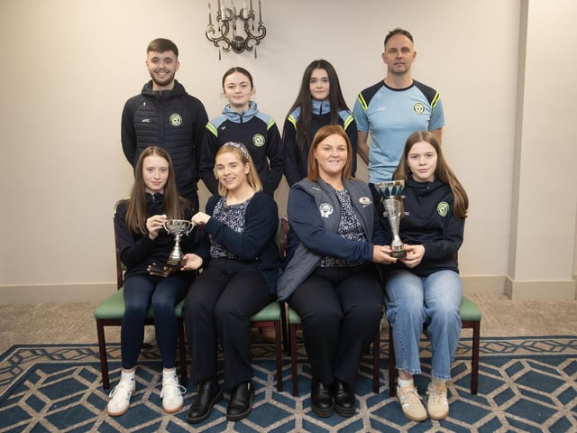 Sion Swifts Ladies Flames u-15s receive the League and Summer Cup trophies from Kerri Pyne and Charlene Morrow, Derry Credit Union, at the D&D Youth FA awards at the Waterfoot Hotel on Sunday night last. Included are Darren Crozier and Jack Forbes. (Photos: Jim McCafferty Photography)