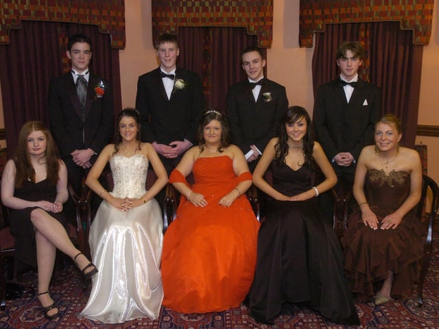 Enjoying the Scoil Mhuire formal at the Inishowen Gateway Hotel are, seated from left, Lorna Caldwell, Sarah Gillespie, Georgina Robinson, Pamela O'Hagan, and Amanda Browne. Standing, from left, Marvin Mulhern, Daniel Henderson, Christopher Doherty, and Robbie O'Dowd. (1801PG01) : Scoil Mhuire Formal in January 2005.