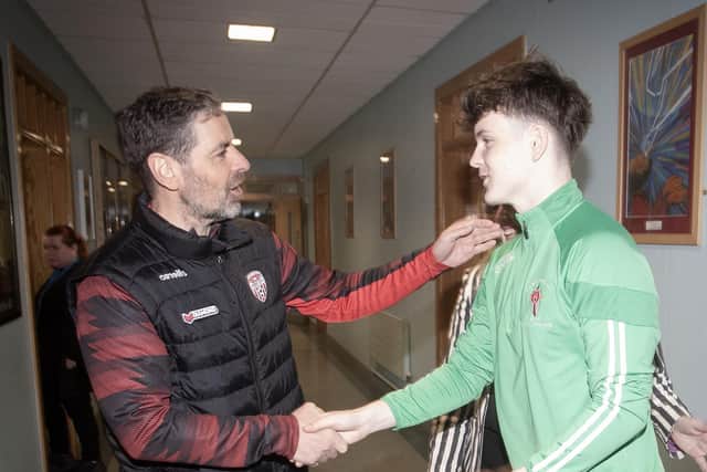 St. Joseph's u-18 captain and Head Boy Ciaran Mullan pictured welcoming Derry City FC manager Tiernan Lynch to the school on Tuesday morning. The Derry supremo called to the school to congratulate the team on their recent NI Schools Cup success. (Photos: Jim McCafferty Photography)