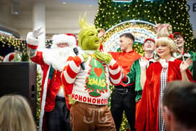 Derry, Northern Ireland. 7 November 2025. Santa and the Grinch share the stage at Foyleside Shopping Centre, switching the Christmas lights back on to applause from the crowd. Credit: Aodhan Roberts. : Joyous scenes as Santa arrives at Foyleside Shopping Centre and the festive lights are turned on. Photos: Aodhán Roberts.