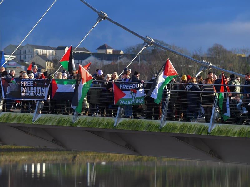 Hundreds of people gather on Derry’s Peace Bridge, on Sunday afternoon, in solidarity with Gaza and Palestinians. Photo: George Sweeney.