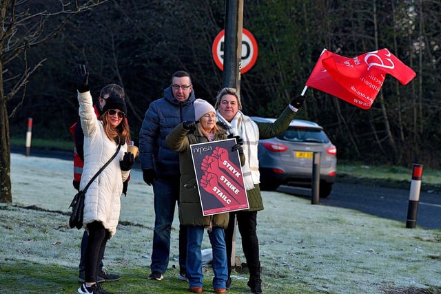 Striking health and social care workers picket outside Gransha on Monday morning. Photo: George Sweeney. DER2250GS – 09