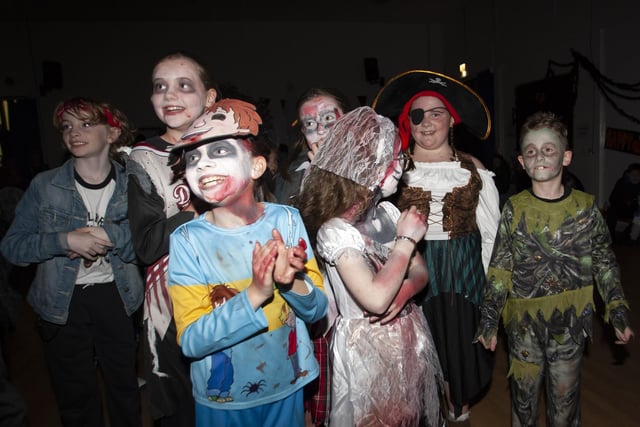 Seth , Ella , Ava , Aoife , Frankie , Lillie and Myla having fun at the Steelstown PS Halloween Disco.