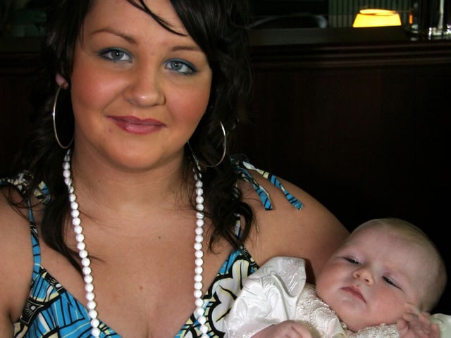 Baby Shanice Devine pictured with her mum Michaela on the occasion of her Christening 0171JML : Parties and celebrations April 2006: Shanice Devine.