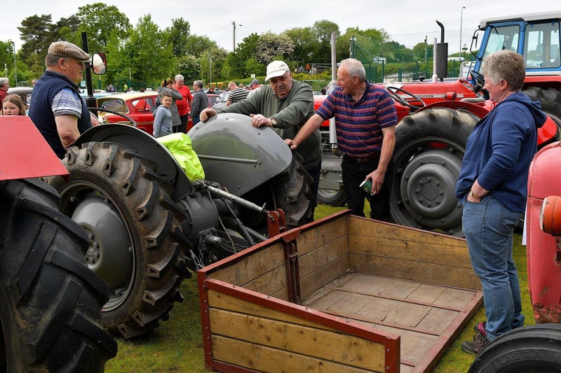 Tractor enthusiasts at the Muff Vintage Show held in the Community Park on Sunday. Photo: George Sweeney.  DER2321GS – 12  