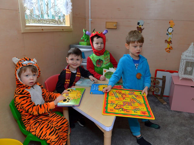Ferdia, Dylan, Elliot and Michéal celebrate World Book day at Belmont Nursery School on Racecourse Road. Photo: George Sweeney. DER2310GS – 30